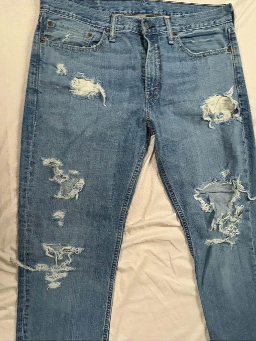 Levi's Men's Distressed Light Blue Straight Leg Denim Jeans